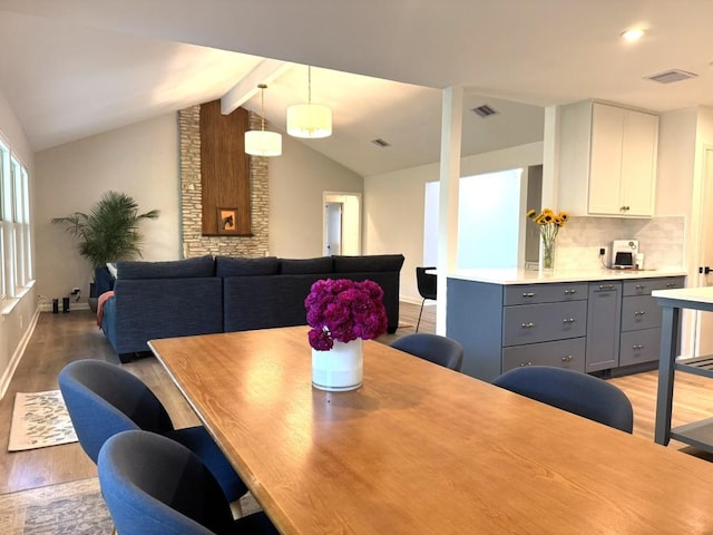 4302 Red Cloud Dr, Austin, TX 78759 - dining room with light wood finished floors and baseboards