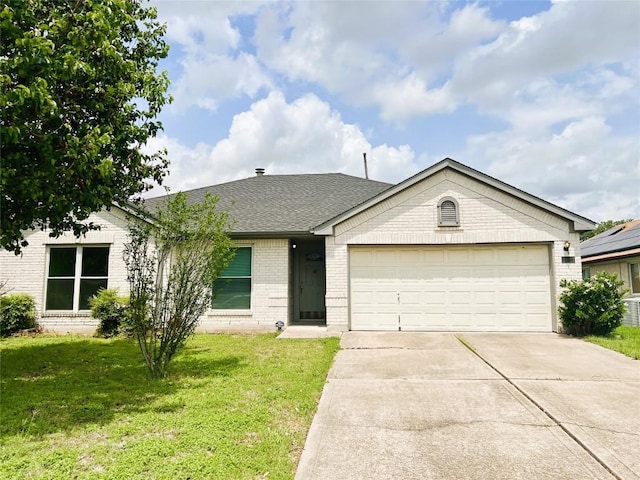 3622 Cheyenne St, Round Rock, TX 78664 - single story home with brick siding, driveway, a garage, a front lawn, and a shingled roof