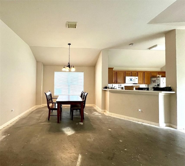 3622 Cheyenne St, Round Rock, TX 78664 - dining room with concrete floors, lofted ceiling, a chandelier, and baseboards