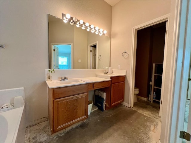 3622 Cheyenne St, Round Rock, TX 78664 - bathroom with double vanity, a bathtub, and toilet