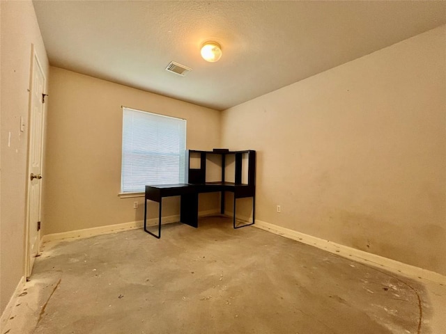 3622 Cheyenne St, Round Rock, TX 78664 - unfurnished bedroom featuring concrete floors and baseboards