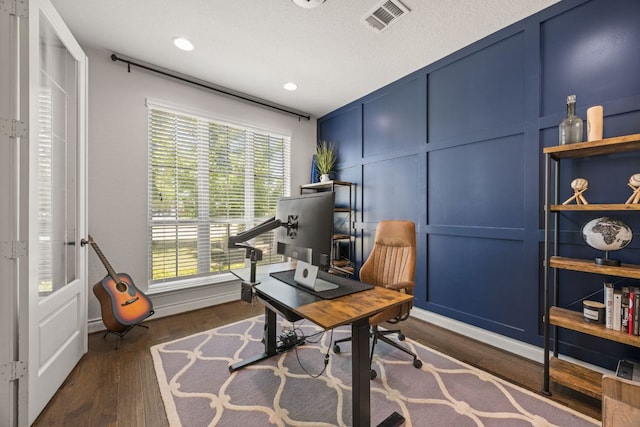 5609 Traviston Ct, Austin, TX 78738 - office space featuring dark wood-style floors, a decorative wall, and recessed lighting
