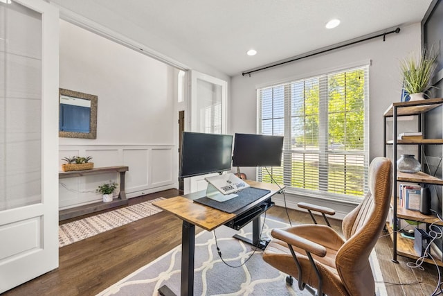 5609 Traviston Ct, Austin, TX 78738 - home office with wainscoting, recessed lighting, wood finished floors, and a decorative wall