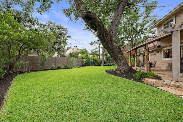 4101 Galacia Dr, Austin, TX 78759 - fenced backyard featuring a patio area and ceiling fan