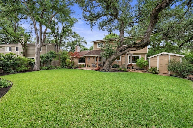 4101 Galacia Dr, Austin, TX 78759 - view of grassy yard featuring a storage shed