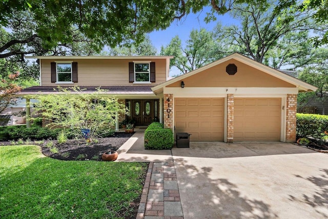 4101 Galacia Dr, Austin, TX 78759 - traditional-style house with a garage, concrete driveway, a front lawn, and brick siding
