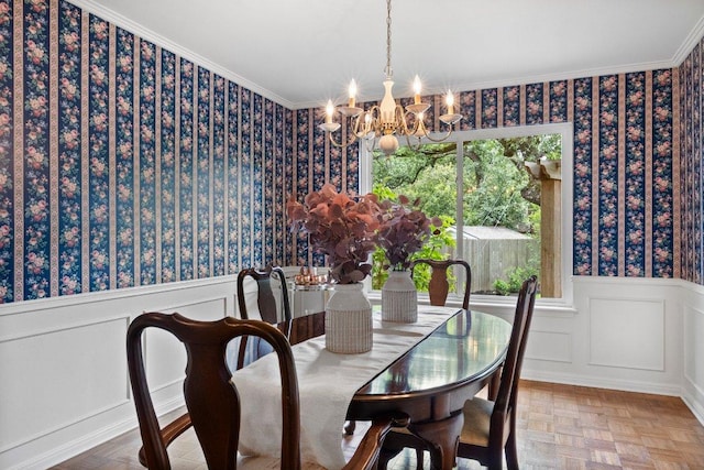4101 Galacia Dr, Austin, TX 78759 - dining room with a chandelier, plenty of natural light, wainscoting, wallpapered walls, and a decorative wall