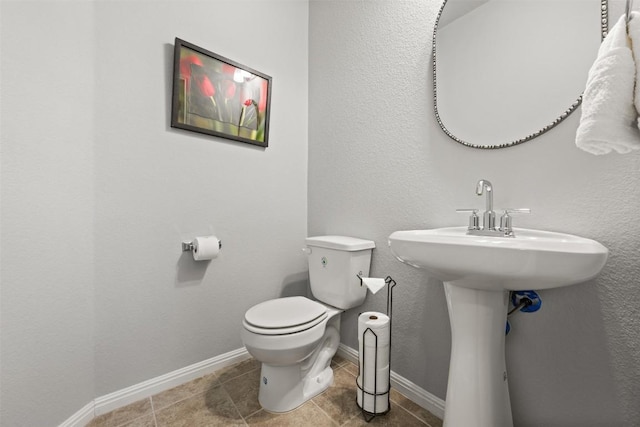 1404 Jenkins Bnd Unit 11, Austin, TX 78748 - bathroom featuring toilet and tile patterned flooring