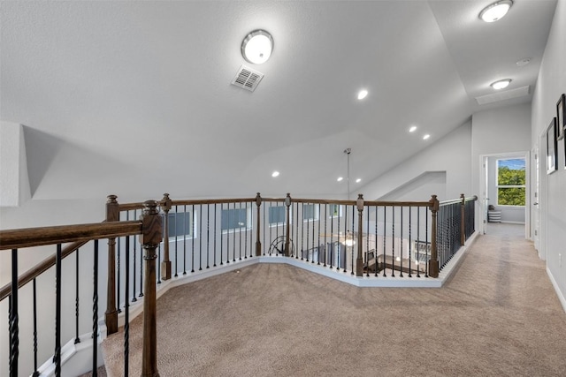 1404 Jenkins Bnd Unit 11, Austin, TX 78748 - hallway with carpet flooring, an upstairs landing, vaulted ceiling, and recessed lighting