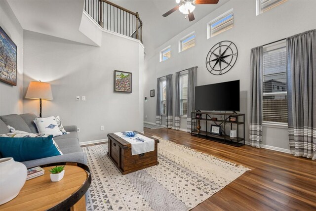 1404 Jenkins Bnd Unit 11, Austin, TX 78748 - living area with ceiling fan, wood finished floors, and a towering ceiling