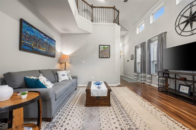 1404 Jenkins Bnd Unit 11, Austin, TX 78748 - living area with a towering ceiling and wood finished floors