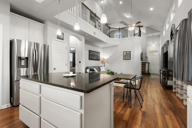 1404 Jenkins Bnd Unit 11, Austin, TX 78748 - kitchen featuring stainless steel fridge, arched walkways, high vaulted ceiling, ceiling fan, and dark wood-style floors