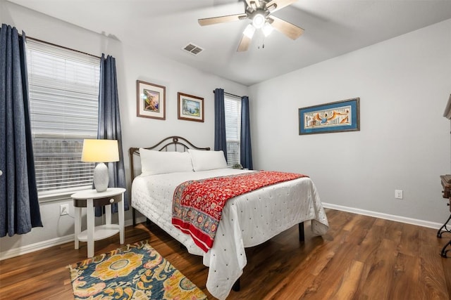 1404 Jenkins Bnd Unit 11, Austin, TX 78748 - bedroom featuring wood finished floors and a ceiling fan