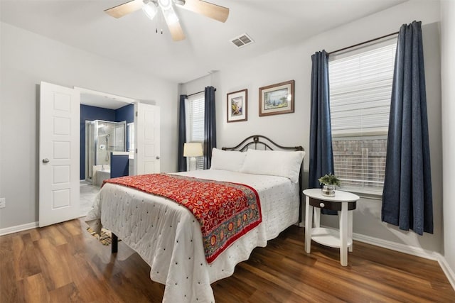 1404 Jenkins Bnd Unit 11, Austin, TX 78748 - bedroom with wood finished floors, connected bathroom, and ceiling fan