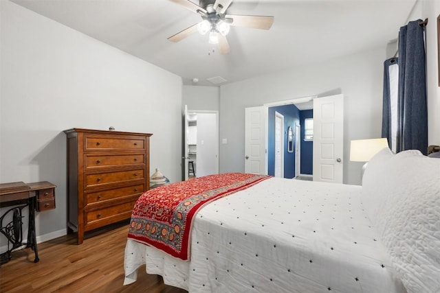 1404 Jenkins Bnd Unit 11, Austin, TX 78748 - bedroom with wood finished floors and ceiling fan