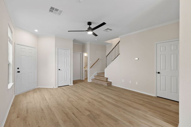 unfurnished living room with a ceiling fan, crown molding, light wood-style floors, and visible vents