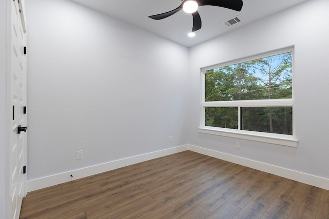 spare room with wood finished floors, ceiling fan, baseboards, visible vents, and recessed lighting