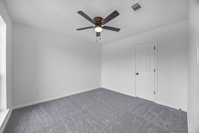 104 Summerwood Cv, San Marcos, TX 78666 - carpeted spare room featuring a ceiling fan and baseboards