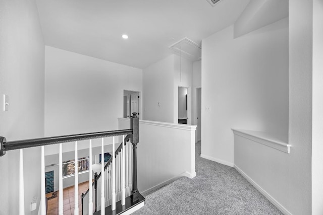 104 Summerwood Cv, San Marcos, TX 78666 - corridor featuring attic access, an upstairs landing, carpet, baseboards, and recessed lighting