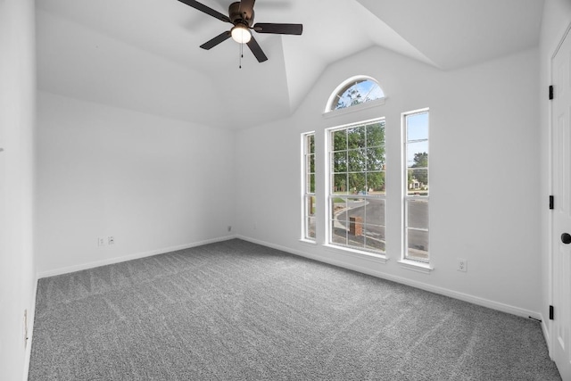 104 Summerwood Cv, San Marcos, TX 78666 - carpeted spare room with vaulted ceiling, a ceiling fan, and baseboards