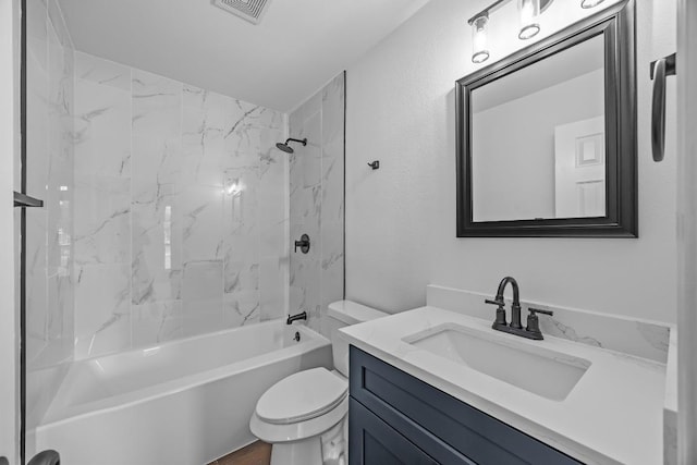 104 Summerwood Cv, San Marcos, TX 78666 - bathroom with vanity, toilet, and tub / shower combination