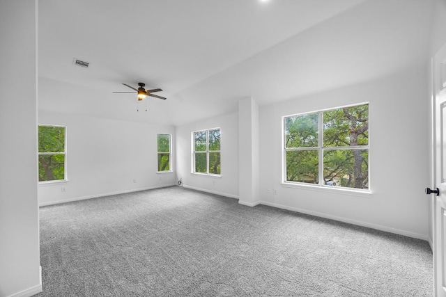 104 Summerwood Cv, San Marcos, TX 78666 - carpeted empty room with a ceiling fan, baseboards, and lofted ceiling