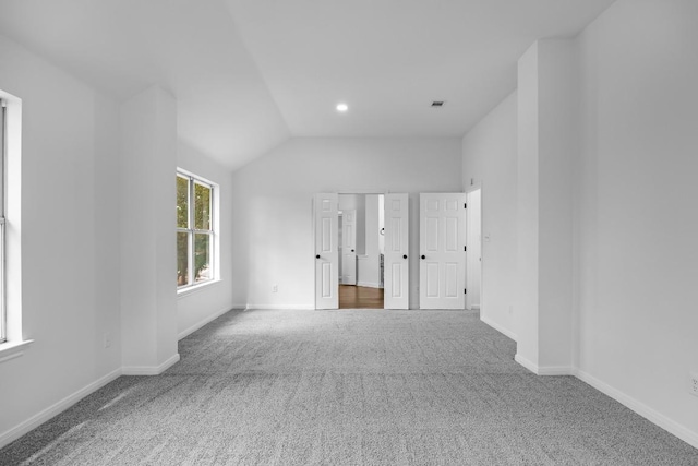 104 Summerwood Cv, San Marcos, TX 78666 - unfurnished bedroom featuring carpet floors, lofted ceiling, baseboards, and recessed lighting