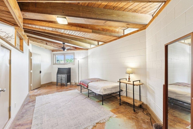 living area featuring beamed ceiling, concrete block wall, a ceiling fan, and wood ceiling