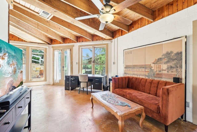 interior space with beamed ceiling, a healthy amount of sunlight, and french doors