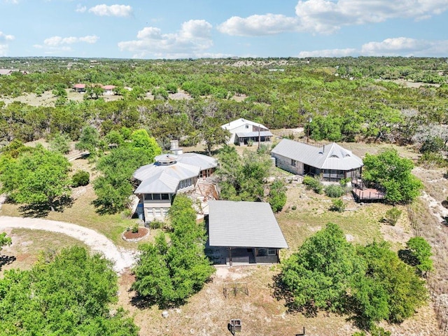 bird's eye view featuring a forest view