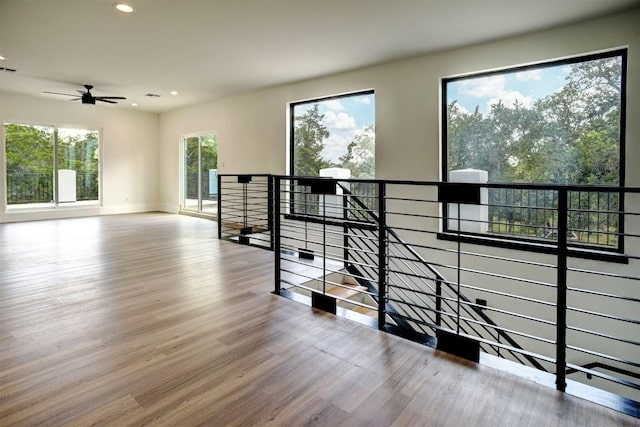 3018 Fm 535th Rd, Red Rock, TX 78662 - spare room with recessed lighting, wood finished floors, ceiling fan, and baseboards