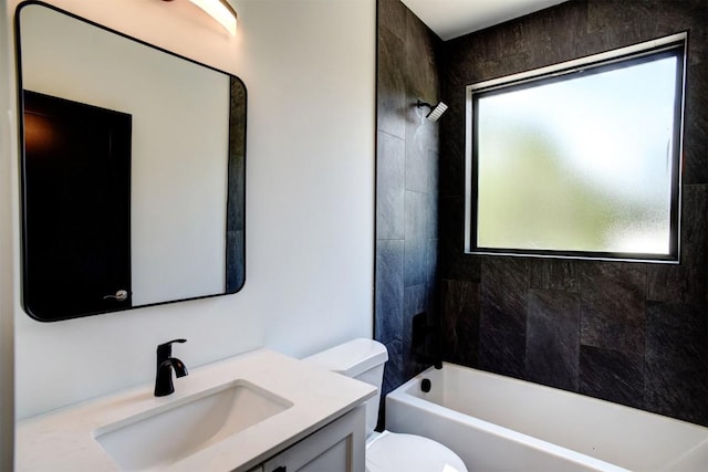 full bath with shower / bathing tub combination, vanity, and toilet