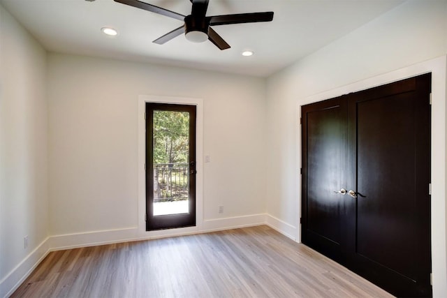 interior space with recessed lighting, light wood-type flooring, and baseboards