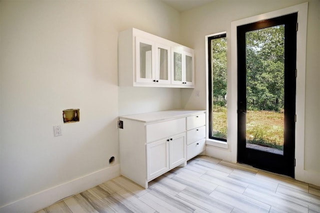 doorway with baseboards