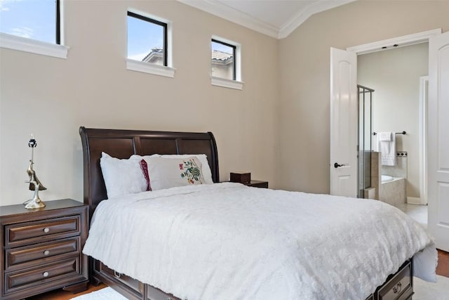 2328 Gilia Dr, Austin, TX 78733 - bedroom with crown molding, ensuite bath, and wood finished floors