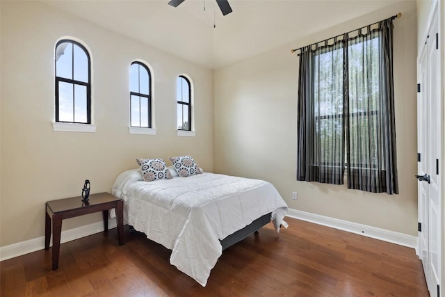 2328 Gilia Dr, Austin, TX 78733 - bedroom with dark wood-type flooring and ceiling fan
