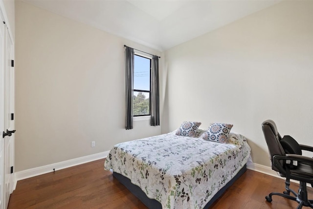 2328 Gilia Dr, Austin, TX 78733 - bedroom featuring baseboards and dark wood-style flooring