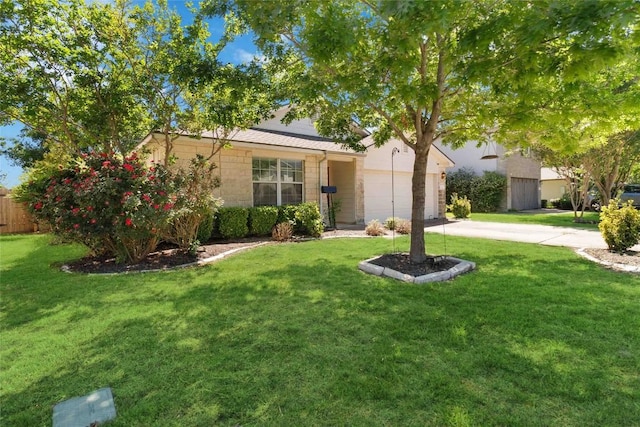 223 Sylvan St, Hutto, TX 78634 - ranch-style house featuring driveway, a garage, and a front yard