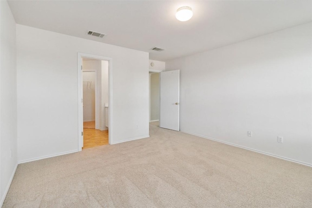223 Sylvan St, Hutto, TX 78634 - unfurnished bedroom with carpet, visible vents, and baseboards