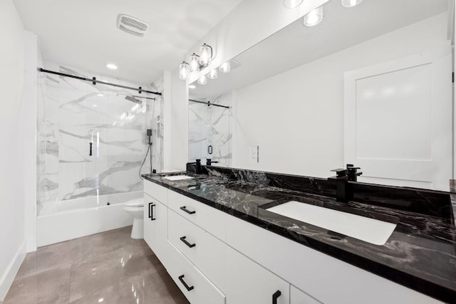 7008 Meador Ave Unit 1, Austin, TX 78752 - full bathroom featuring enclosed tub / shower combo, double vanity, visible vents, toilet, and a sink