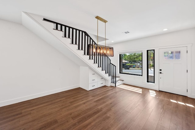 7008 Meador Ave Unit 1, Austin, TX 78752 - foyer featuring recessed lighting, wood finished floors, visible vents, and stairs
