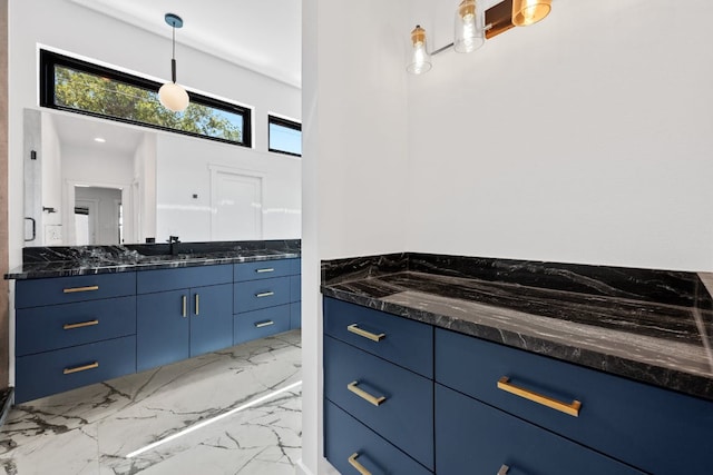 7008 Meador Ave Unit 1, Austin, TX 78752 - bathroom featuring marble tiled flooring and vanity