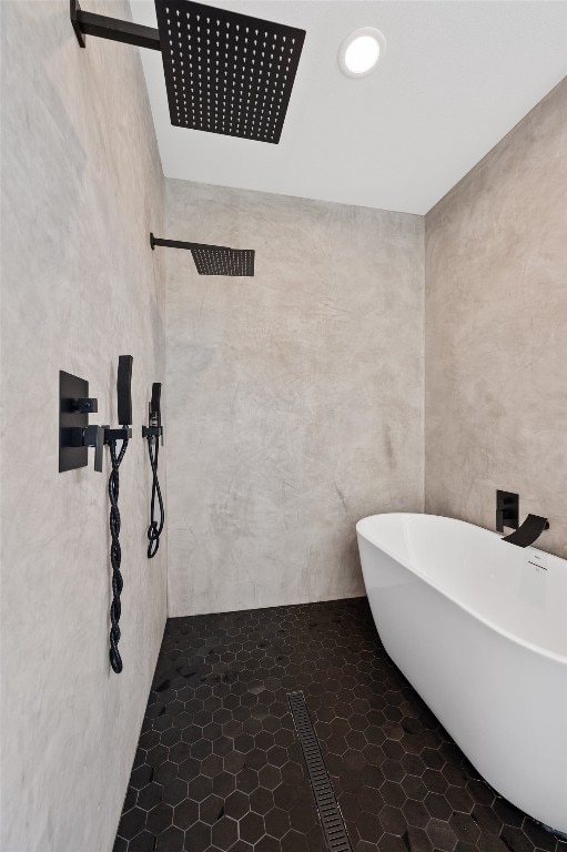 7008 Meador Ave Unit 1, Austin, TX 78752 - bathroom with a tile shower and a soaking tub