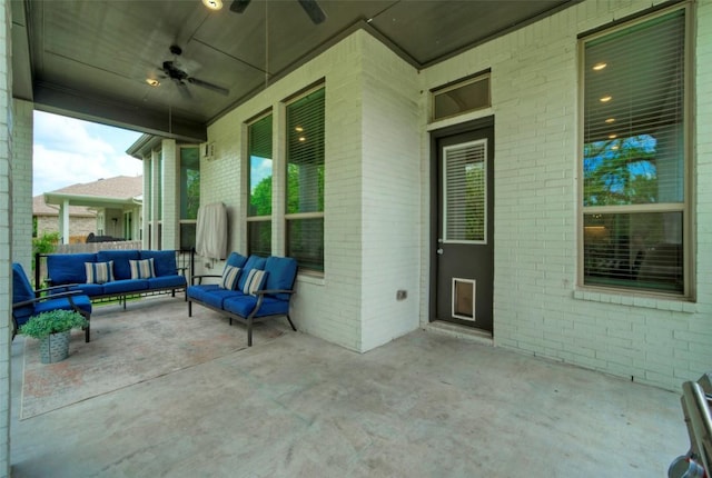 view of patio with ceiling fan and an outdoor hangout area