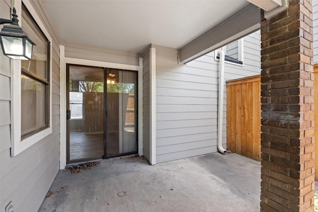entrance to property with a patio area