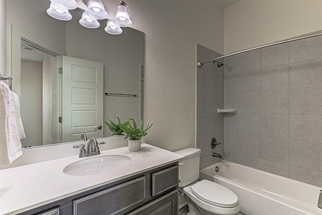 1801 Lakeside Ranch Rd, Georgetown, TX 78633 - full bathroom featuring a textured wall, toilet, vanity, and bathing tub / shower combination