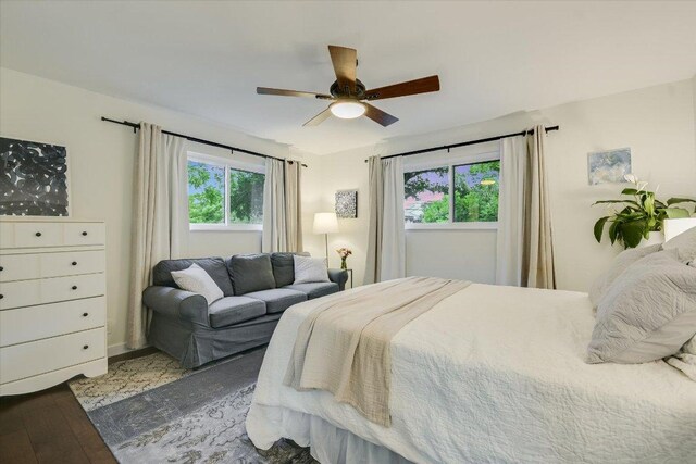 bedroom featuring a ceiling fan and wood finished floors