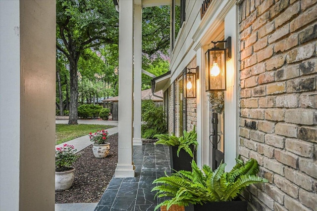 exterior space featuring brick siding