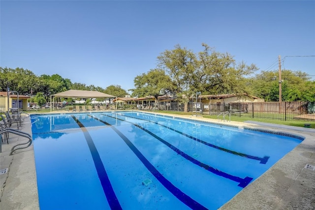 pool featuring fence