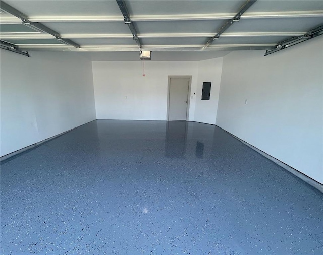 7500 Traylor Cv, Austin, TX 78724 - garage featuring electric panel and a garage door opener